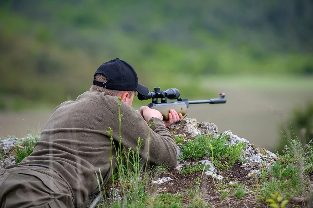 male-with-a-gun-in-hunting-period-2021-08-28-11-02-18-utc